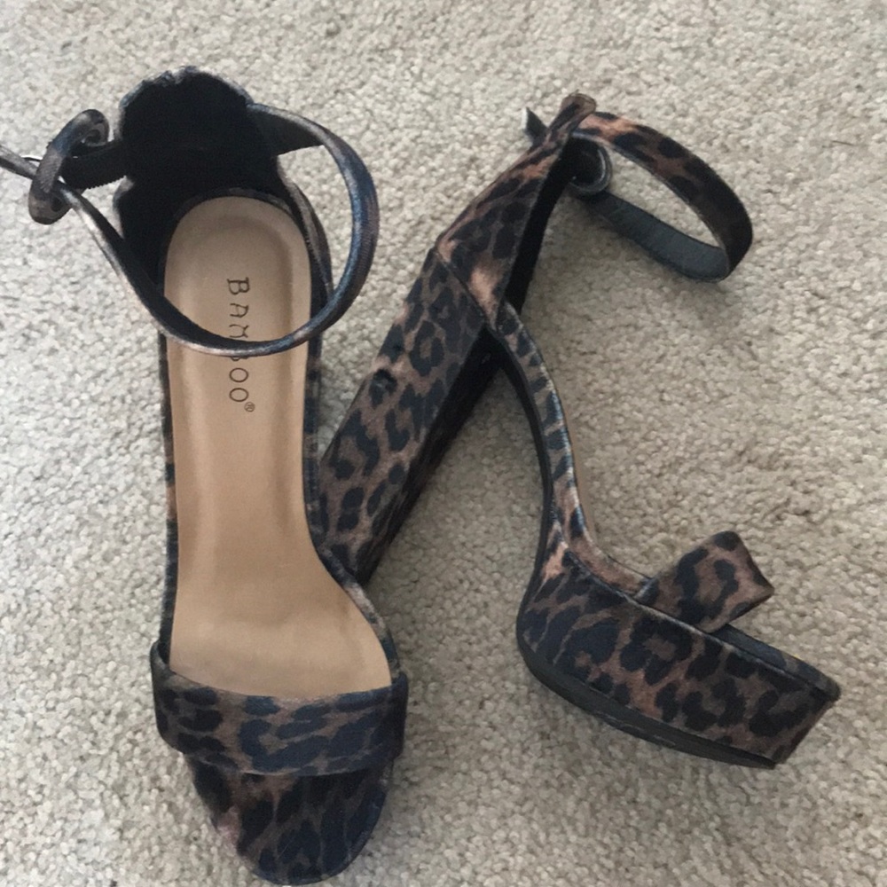 Only been worn once, cheetah platform heels